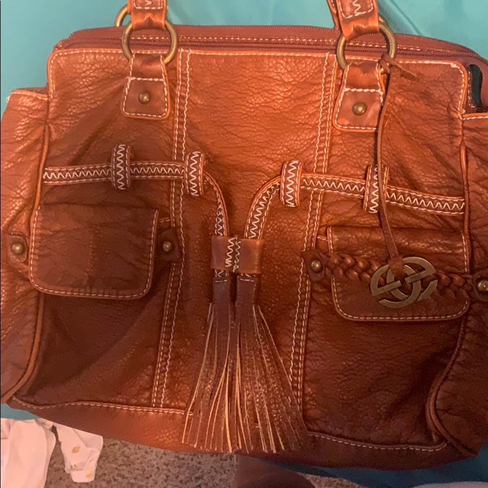 RED by Marc Ecko bag
Gently used